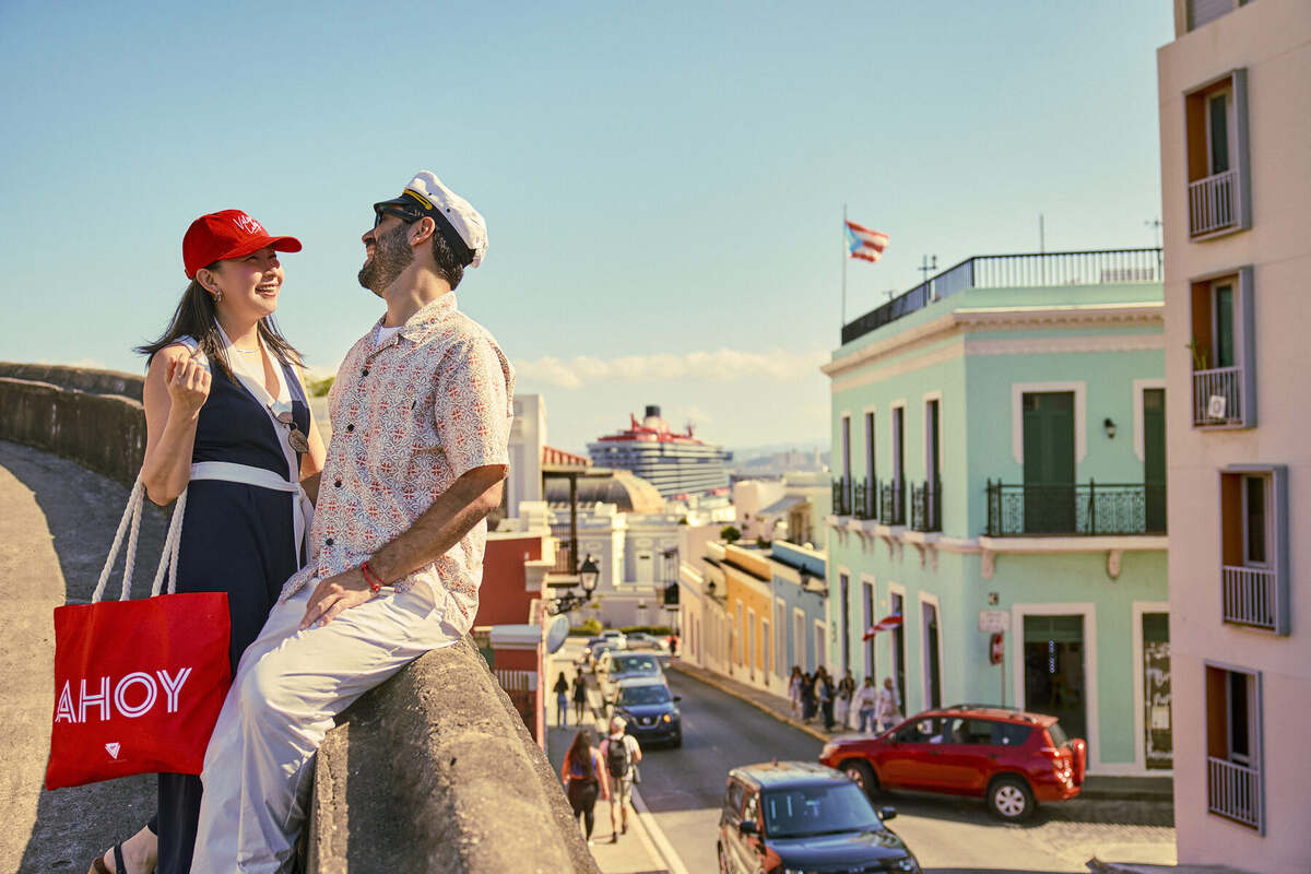 Guests overlooking Old San Juan, Puerto Rico, with the ship in port
