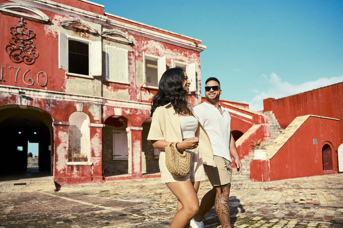 Couple exploring a historic fort in St. Croix